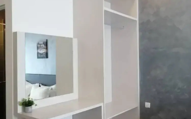 2 Bedroom Near Airport at Aeropod Sovo Studio