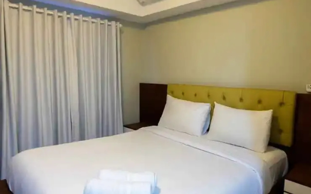 Relaxing 2BR with City View The Wave Apartment By Travelio
