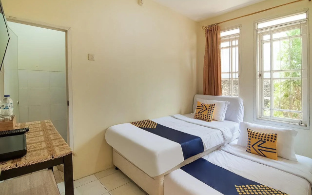 Spot On 3988 Kost Carmelia Baranangsiang Syariah