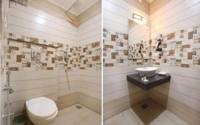 Tricity Relax Inn by OYO Rooms
