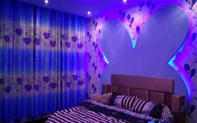 Xinyang Cozy Themed Hotel (Normal University East Gate)