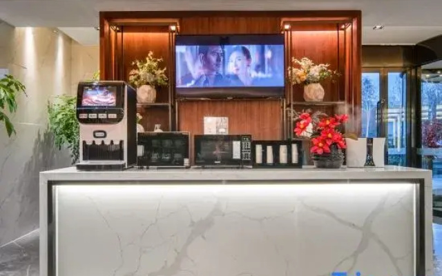 Xindi Hotel (Zhengzhou Zhongyuan Wanda Store Qinling Road Subway Station)