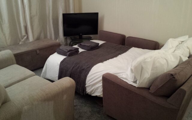 Апартаменты Pacific Quay Apartment комната для гостей