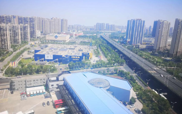 Elan Inn Nantong Yongxing Shangmeijia