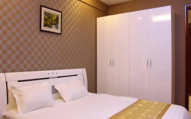 Dalian Jiuxing Apartment