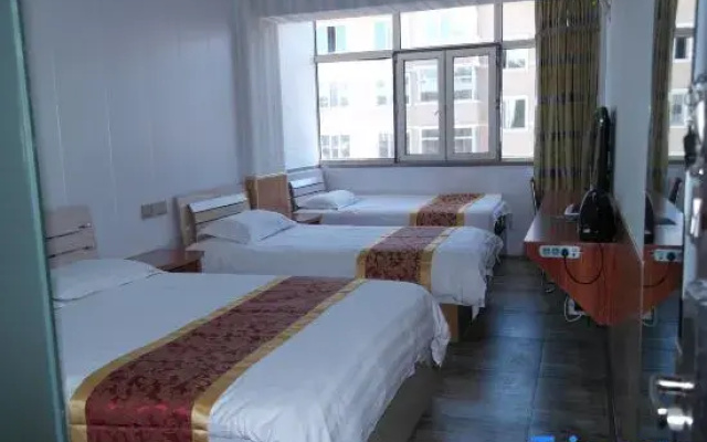 Home Huayi Hotel (Mudanjiang Normal University)
