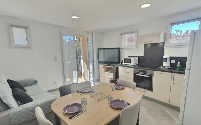 Agréable appartement climatisé à 25m de la plage