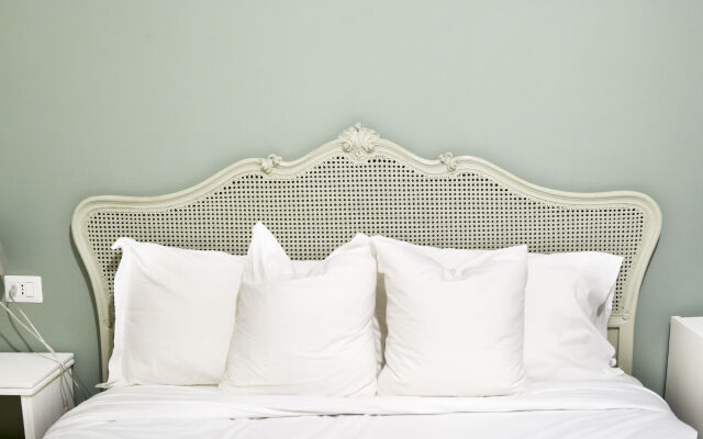 Отель La Piazzetta Rooms Генуя комната для гостей