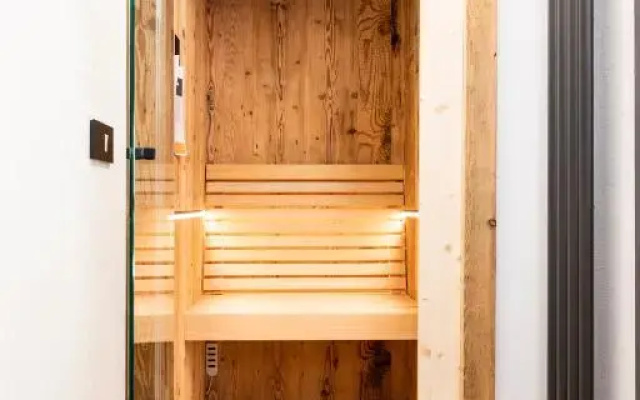 Sa Mont Home - Moderno appartamento con giardino, sauna, barbecue