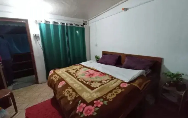 Goroomgo Ananda Homestay Kausani