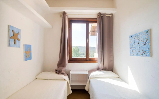 Serene Holiday Home in Marinella With Garden