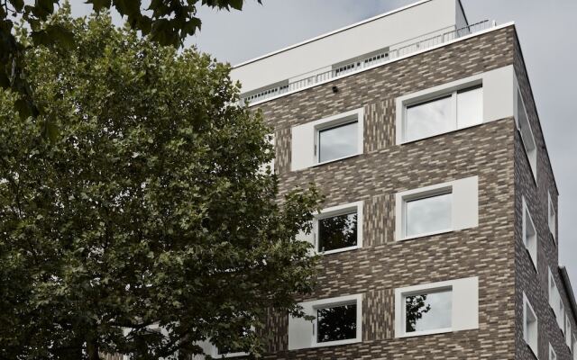 Отель ipartment Concrete Köln Mülheim Кёльн вид на фасад