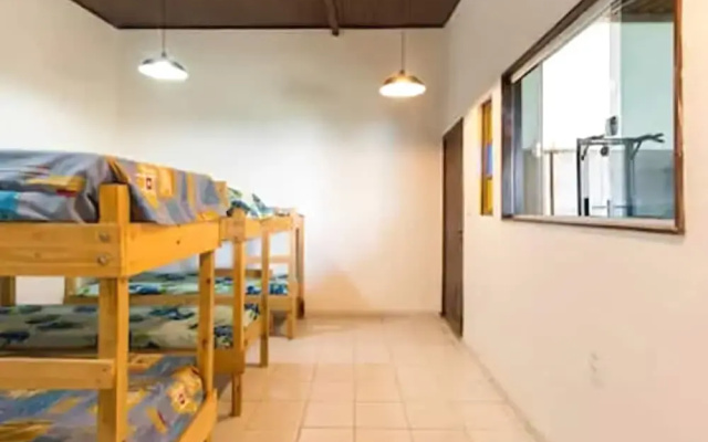 Man Cave Hospedaria