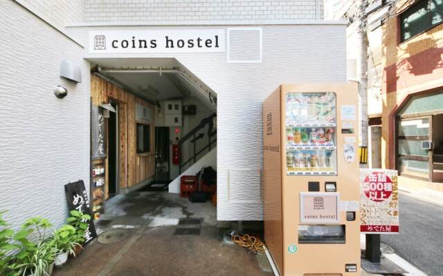 Coins Hostel Tenjin Фукуока вид на фасад