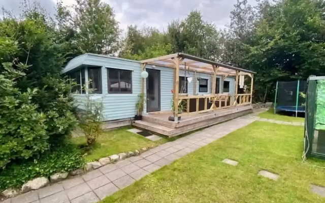 Lovely Chalet in De Pol With Garden