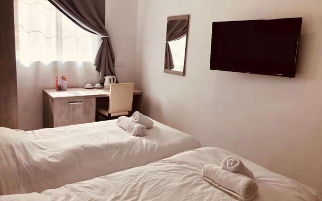Отель Napoli Suites Сан Джулианс