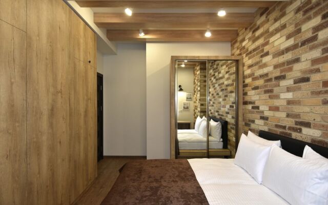 Апартаменты Gallery Apartments C комната для гостей