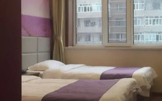 Xinyue Hotel (Mudanjianghuochebeizhanxinhualudian)