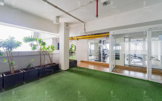 RedLiving Apartemen Grand Kamala Lagoon by owner room
