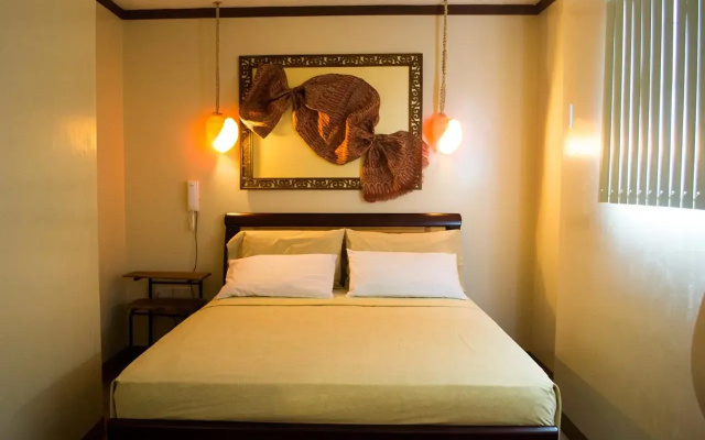 Bahay Ni Tuding Inn & Bistro
