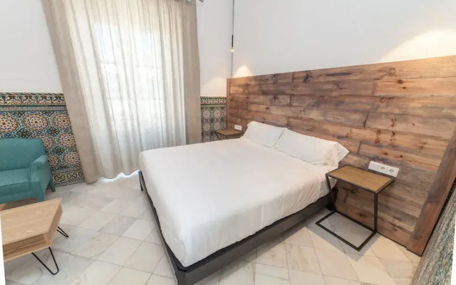 La Casa Amarilla Rooms & Suites