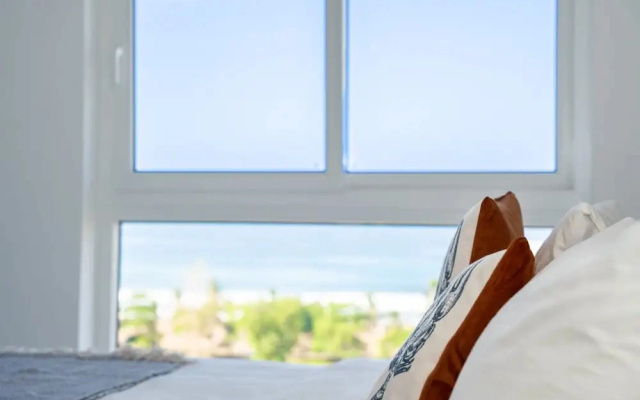 Ocean View Condo Steps to Beach & Comfort