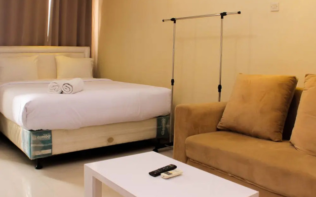 Comfort Studio Room At Oasis Cikarang Apartment