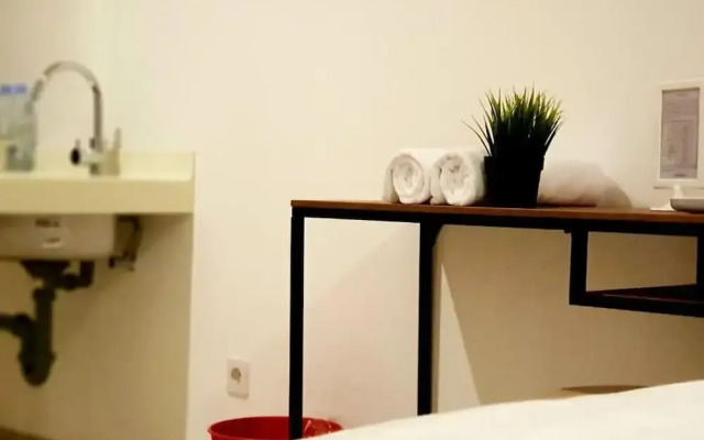 Alpine Room at TreePark City Apartement