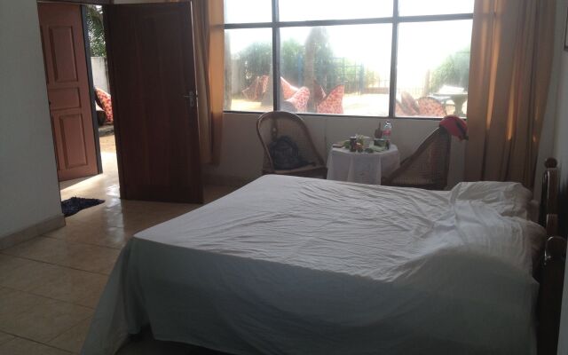 Отель Marigold Beach House комната для гостей