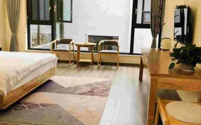 Pengzhou Longmen Four Seasons Homestay