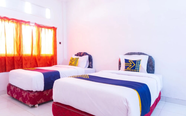 Citra Palm Residence by OYO Rooms