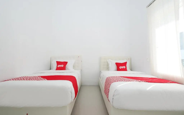 Capital O 1888 Griya RW Family Guest House