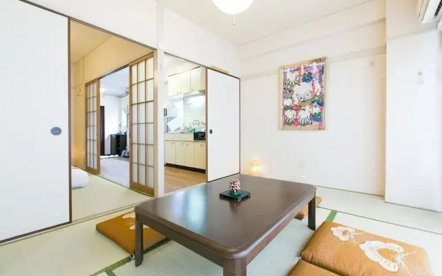 Aki Building 402