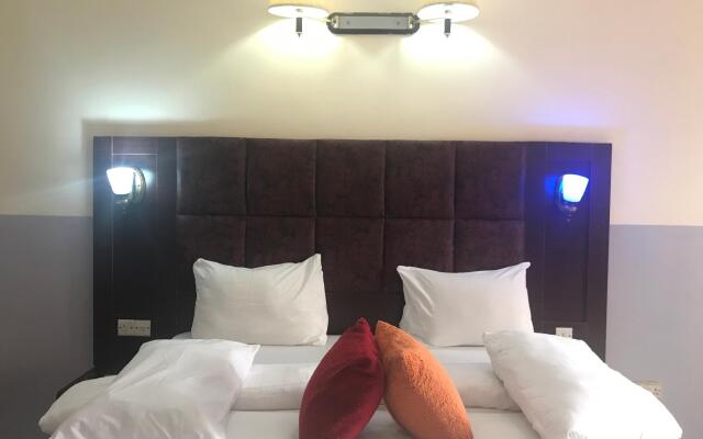 Nondon International Hotel Энугу комната для гостей