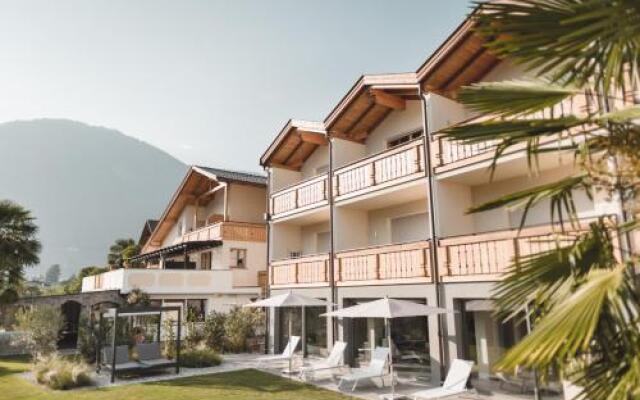 Hotel Tiefenbrunn Лана вид на фасад