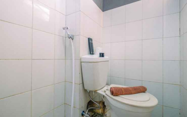 Compact and Homey 2BR Cibubur Village Apartment By Travelio