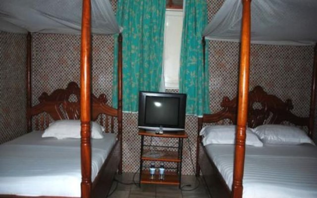 Отель Sandton Hotel Kasese Уганда, Национальные парки западной Уганды - отзывы, цены и фото номеров - забронировать отель Sandton Hotel Kasese онлайн комната для гостей