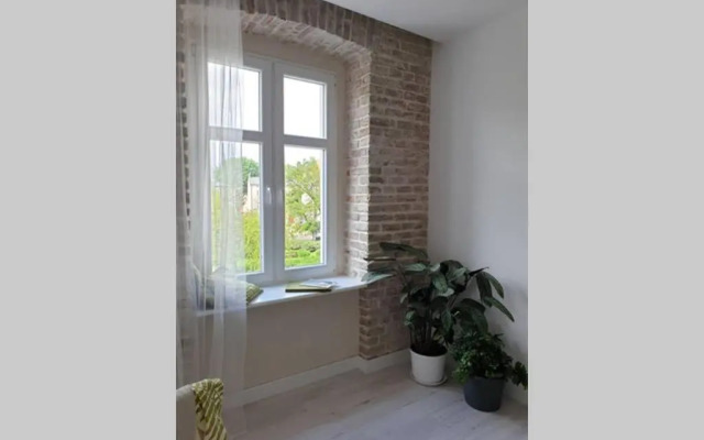 Apartament w kamienicy Przy Plantach