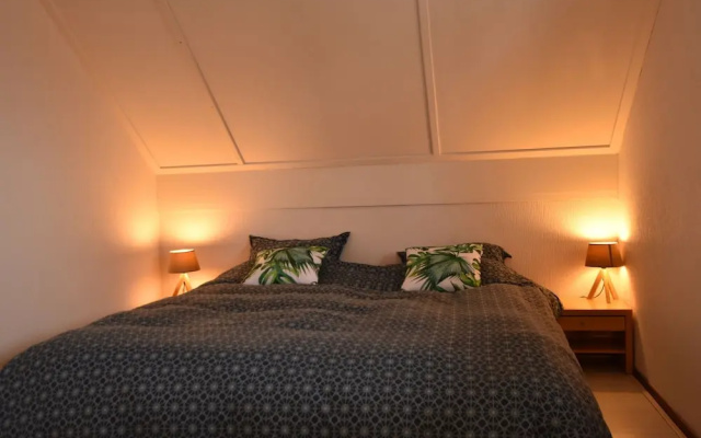 Exclusive Holiday Home Floating on a Lake in Friesland