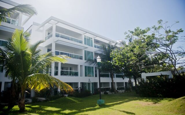 Отель Sunny apartment at the beach with pool Доминикана, Пунта Кана - отзывы, цены и фото номеров - забронировать отель Sunny apartment at the beach with pool онлайн вид на фасад