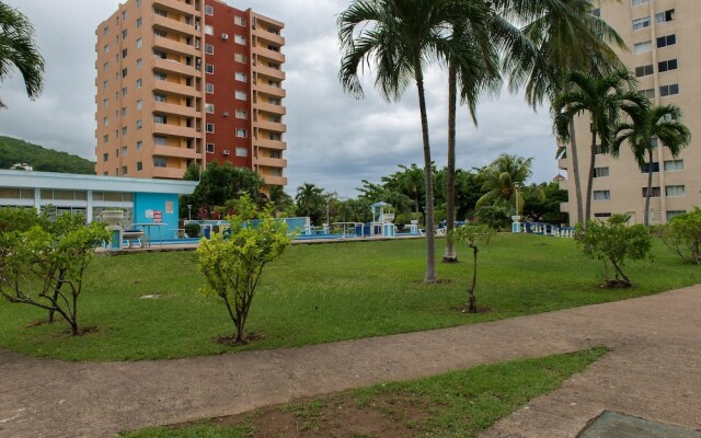 Апартаменты Sky Blue Beach Studio at Turtle Towers вид на фасад