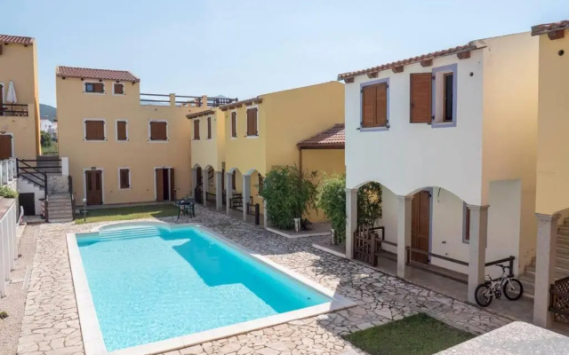 Appartamento con piscina comune.