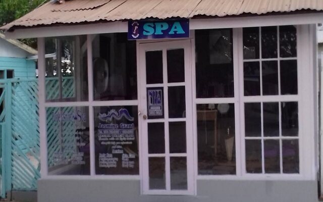 Отель Negril Beach Club Ямайка, Негрил - отзывы, цены и фото номеров - забронировать отель Negril Beach Club онлайн вид на фасад