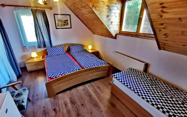 Gyöngyvirág Ház