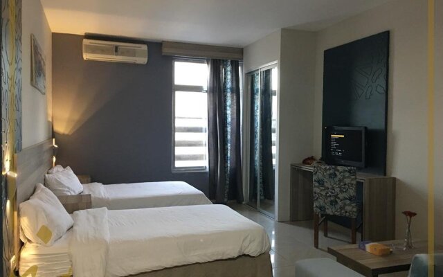 Sana Hotel Apartments Амман комната для гостей