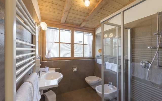 Aparthotel Familiaris - Family Apartments - Pools & Spa in the Dolomites