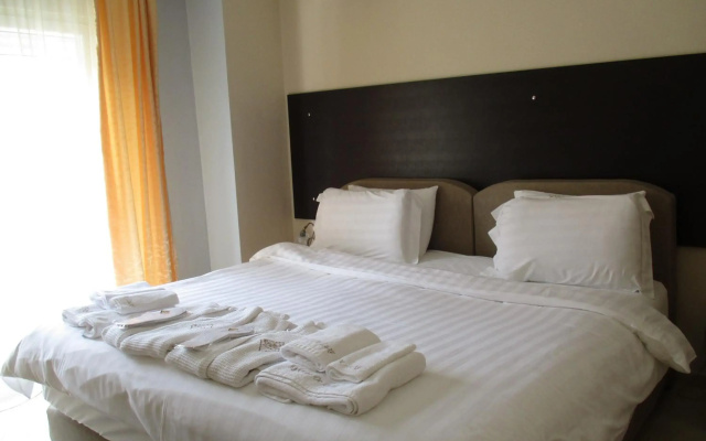 Kyknos De Luxe Suites & Rooms