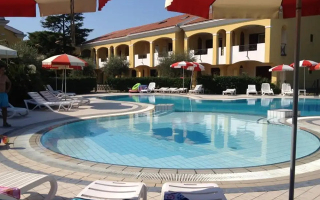Three-storey Apartment With Shared Pool and Patio