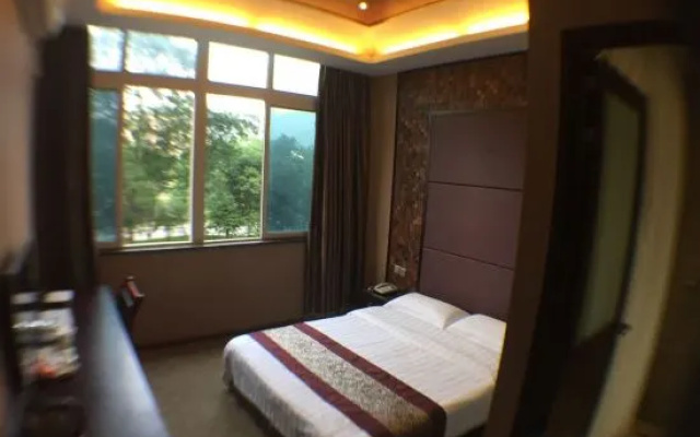 Jinxiu Zhixing Business Hotel