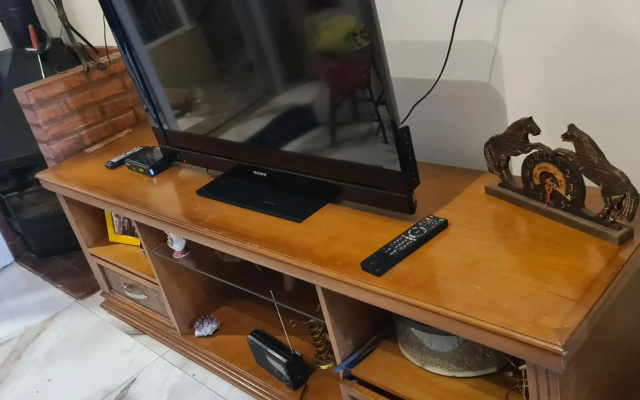 Kitnet casal e apartamento com lareira e vista jardim
